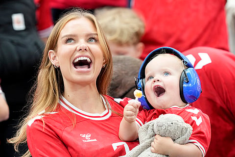 Fans watch match between Denmark and England 